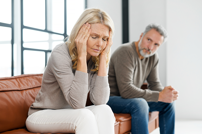 Frustrated senior couple at home